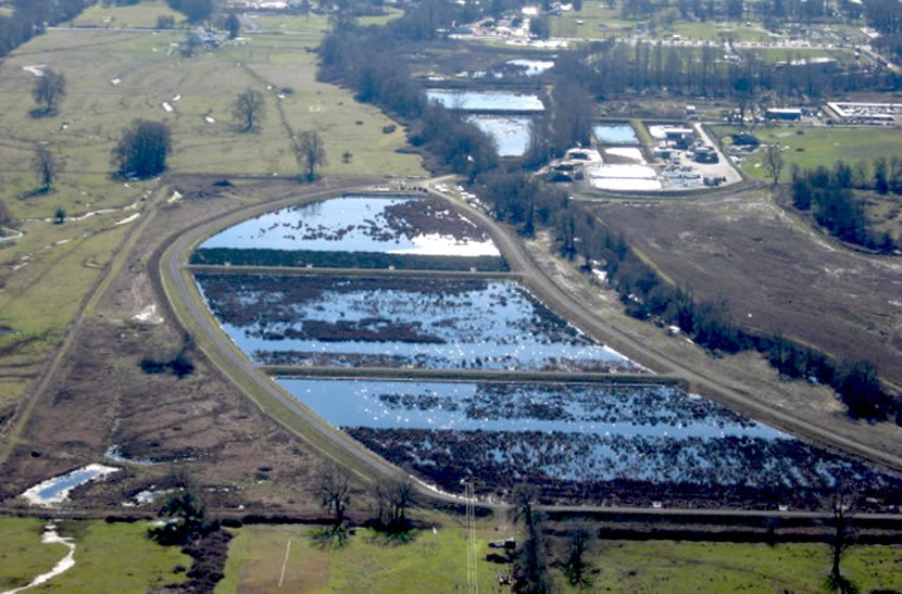 2013 aerial image highlights storage and wetland treatment lagoons.